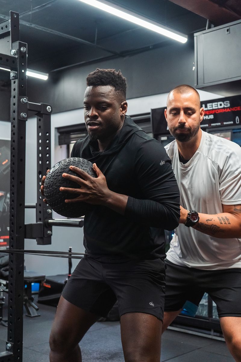 Ronaldo Vieira performing a medicine-ball drill coached by Dion Tsolakis